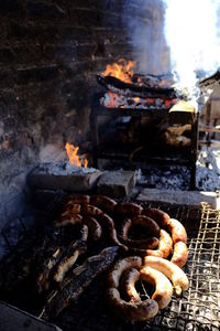 Close-up of meat on barbecue grill