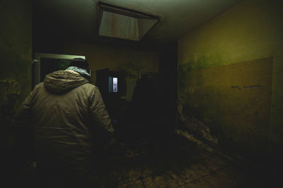 Rear view of man at home