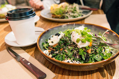 High angle view of salad in bowl on table