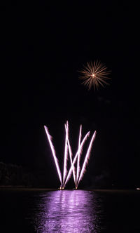 Firework display at night