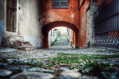 Walkway amidst buildings