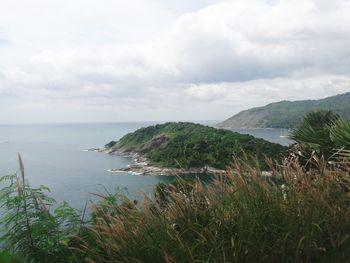 Scenic view of beach and sea against sky