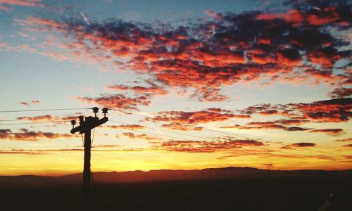 Low angle view of silhouette tree against sky during sunset