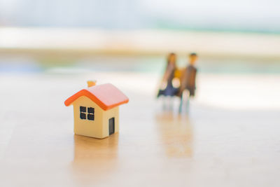 Close-up of toy house on table