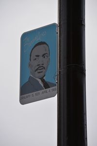 Martin luther king jr drawn on placard attached pole