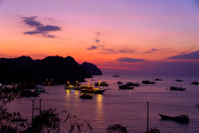 Scenic view of sea against sky at sunset