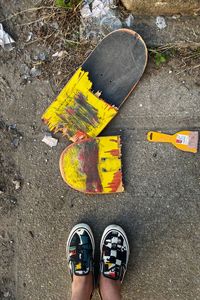 Low section of person standing on street
