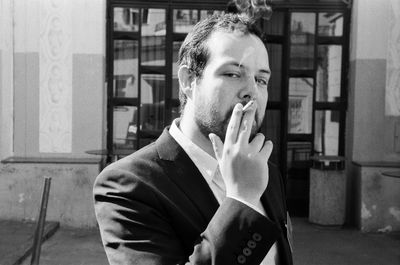 Young man smoking cigarette