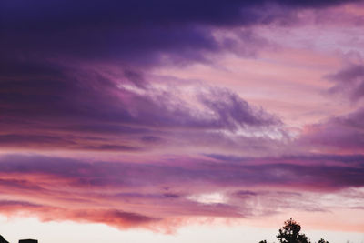 Low angle view of dramatic sky during sunset