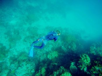 Boy swimming in sea