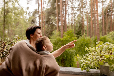 Happy grandmother and grandson enjoy time together. positive middle age woman