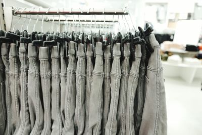 Close-up of clothes drying on metal