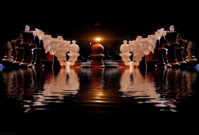 Reflection of illuminated buildings in water