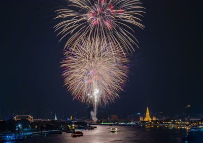 Firework display at night