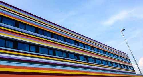 Low angle view of building against blue sky