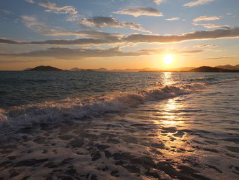 Scenic view of sea against sky during sunset