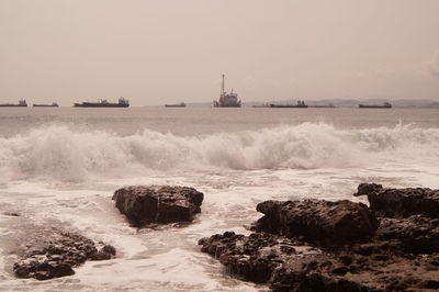 Scenic view of sea against clear sky