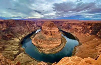 Panoramic view of rock formations against sky