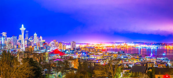 Illuminated buildings in city at night