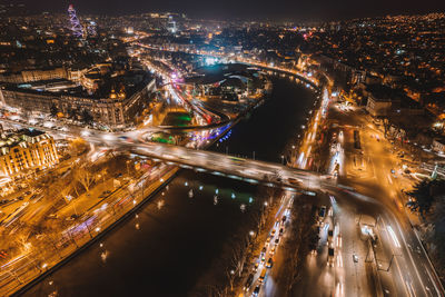 High angle view of illuminated cityscape at night