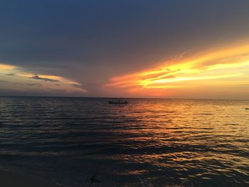 Scenic view of sea at sunset