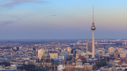 View of communications tower in city