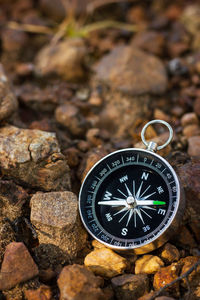 Close-up of arrow symbol on rock