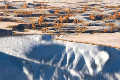 Panoramic view of lake against sky during winter