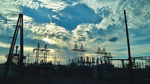 Low angle view of construction site against sky