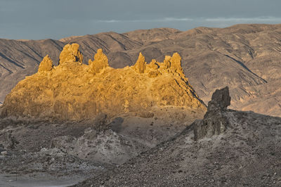 Scenic view of rock formation at desert against sky