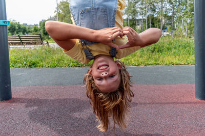 Portrait of smiling girl in playground