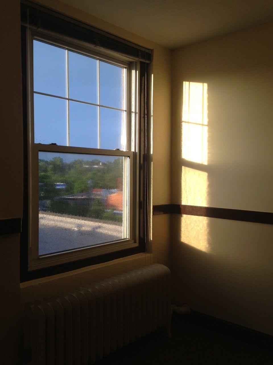 window, indoors, glass - material, transparent, glass, house, home interior, built structure, architecture, reflection, curtain, looking through window, window frame, day, no people, window sill, sunlight, open, door, closed