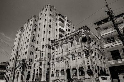 Low angle view of buildings against sky in cuba