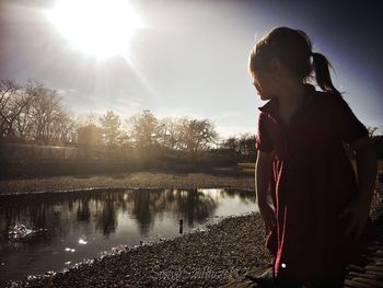Woman looking at sunset