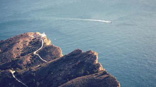 High angle view of rock formation in sea