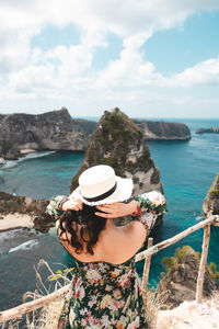Young pretty asian woman feeling relax with mountain view in bali.