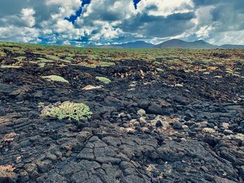 Scenic view of land against sky