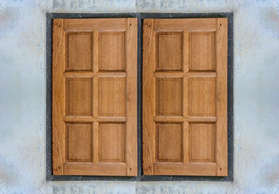 Closed wooden door of house