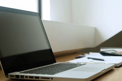 Low angle view of laptop on table