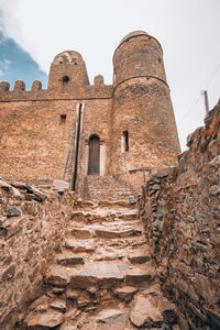 Low angle view of old building against sky