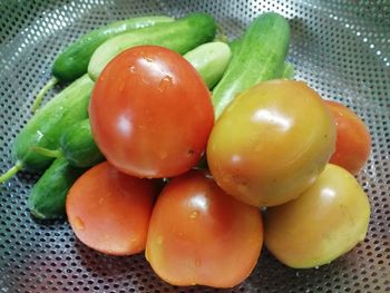 High angle view of cherry tomatoes on table