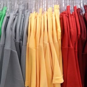 Close-up of clothes hanging on display at store