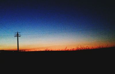 Scenic view of landscape at sunset