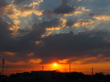 Scenic view of dramatic sky during sunset