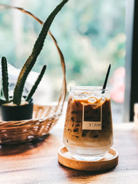 Close-up of drink in glass jar on table