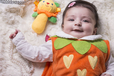 Close-up portrait of cute baby toy