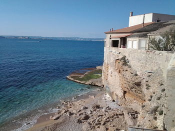 Scenic view of sea against blue sky