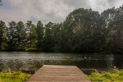 View of lake against cloudy sky