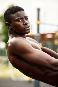 Side view of man exercising in gym