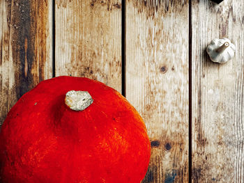 Directly above shot of pumpkin on wooden table